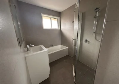 Completed bathroom renovation with modern vanity and tiling in Bilinga Gold Coast