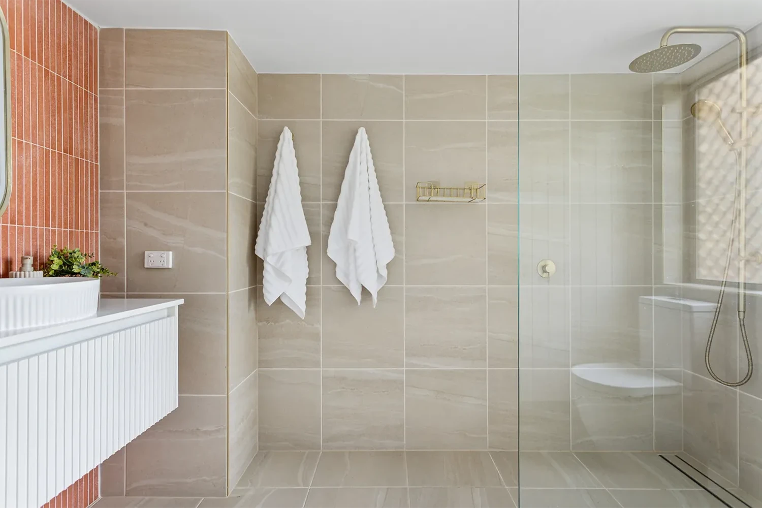 Apartment bathroom renovation with wall-hung vanity and walk-in shower, Palm Beach Gold Coast