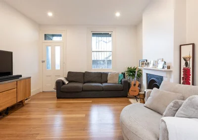 Renovated living space with new flooring and fresh paint in Mudgeeraba