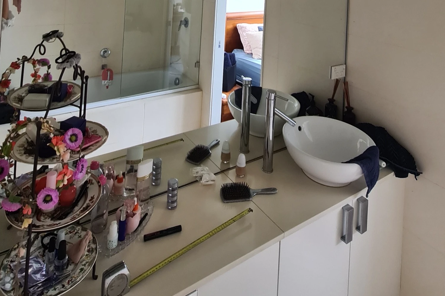 Old bathroom with dated tiles and fittings before renovation in Currumbin