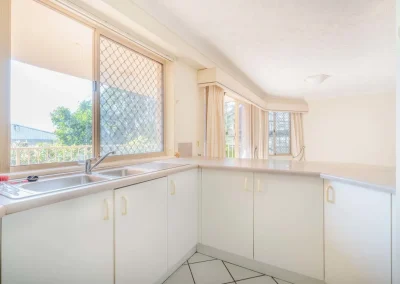 Original apartment living area before renovation at Gold Coast Highway Palm Beach
