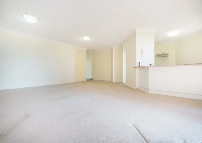 Worn apartment bathroom before renovation at Gold Coast Highway Palm Beach