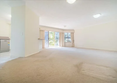 Old apartment interior with dated finishes before renovation at Gold Coast Highway Palm Beach
