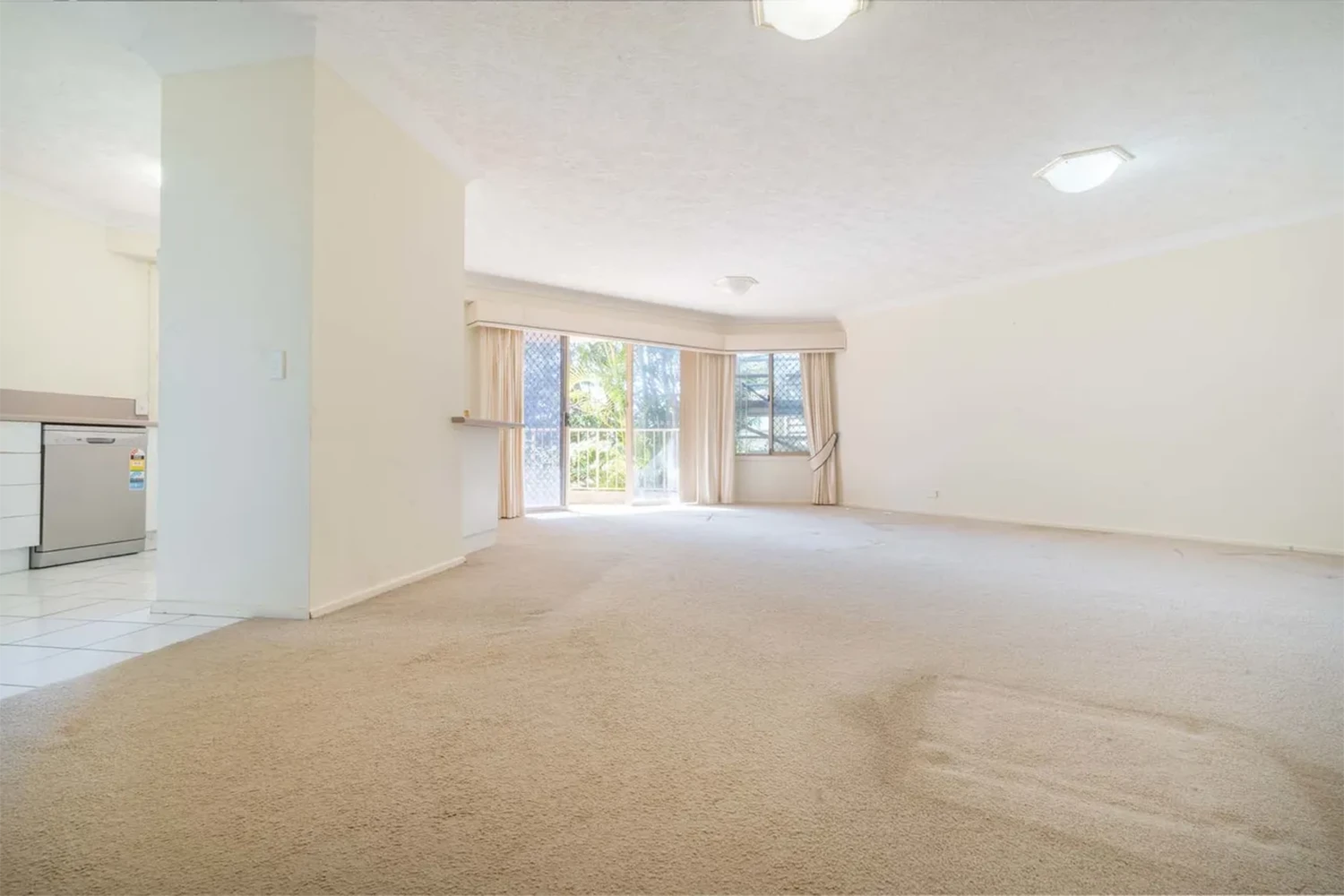 Old apartment interior with dated finishes before renovation at Gold Coast Highway Palm Beach