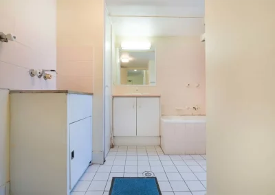 Dated apartment bedroom before renovation at Gold Coast Highway Palm Beach