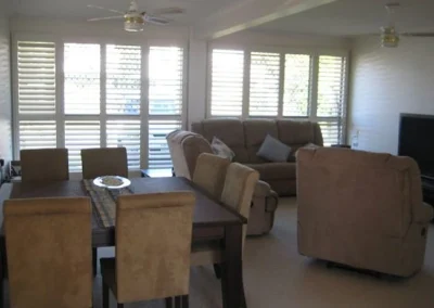 Original home exterior and interior before renovation at Koomooloo Court Mermaid Waters