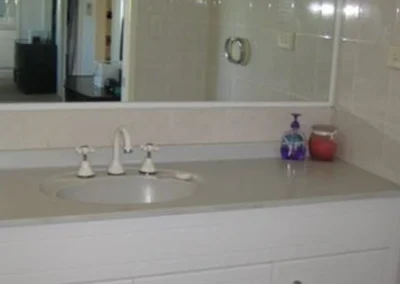 Original interior finishes before home renovation at Koomooloo Court Mermaid Waters