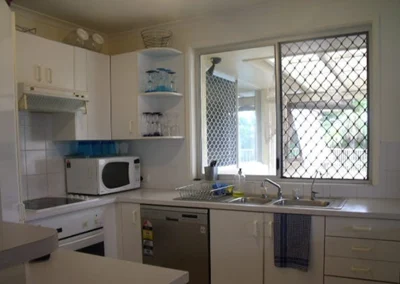 Old interior with tired finishes before home renovation at Koomooloo Court Mermaid Waters