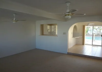 Original hallway and living space before renovation at Koomooloo Court Mermaid Waters