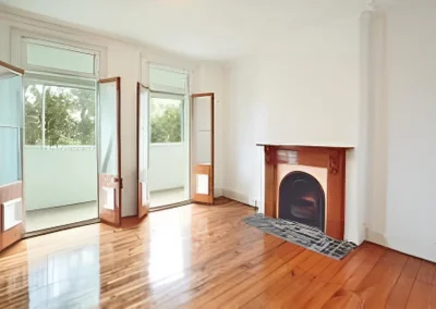 Worn living space with old fixtures before home renovation in Mudgeeraba