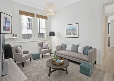 Dated lounge room with old finishes before renovation in Burleigh Heads
