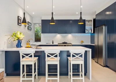 Completed kitchen renovation with modern cabinetry and stone benchtops in Currumbin