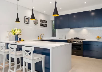 Modern kitchen renovation in Woollahra featuring navy blue cabinetry