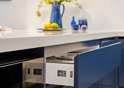 Renovated kitchen with sleek cabinetry and storage in Currumbin