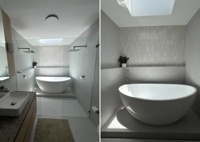 Bathroom renovation with freestanding bath, timber vanity and walk-in shower at Palm Beach